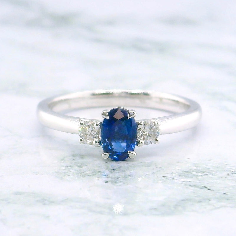 Oval Cut Blue Sapphire & Oval Side Diamonds