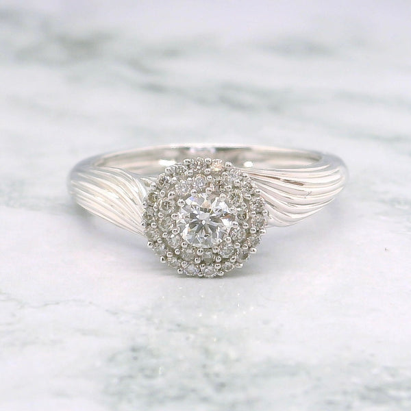 Round Shape Swirled Diamond Ring