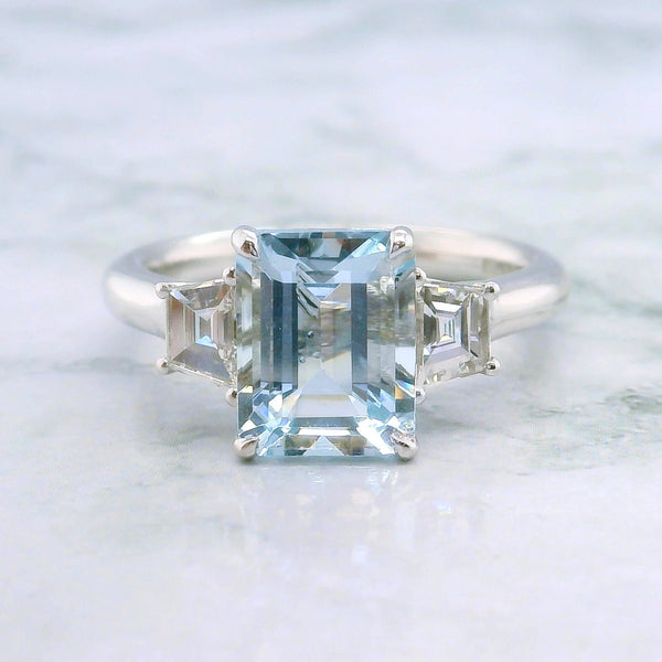 Aquamarine Emerald Cut Centre Trilogy Diamond Ring