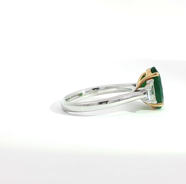 Oval Cut Emerald and Diamond Trilogy Engagement Ring