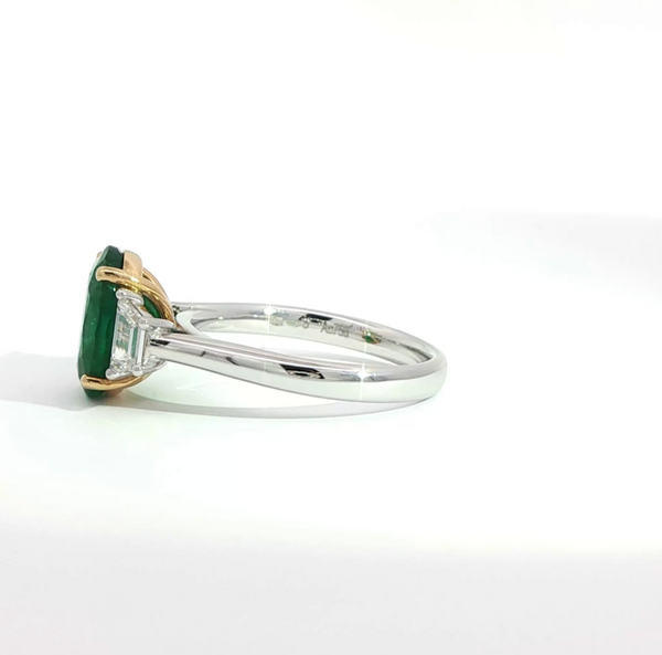 Oval Cut Emerald and Diamond Trilogy Engagement Ring