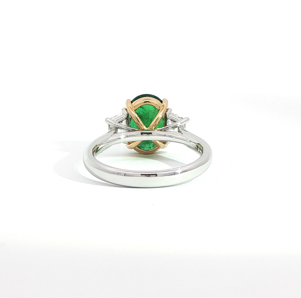 Oval Cut Emerald and Diamond Trilogy Engagement Ring