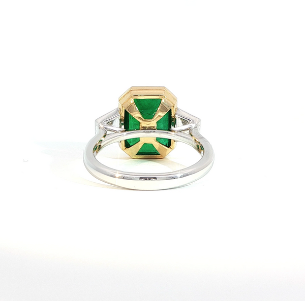 Emerald Cut Emerald and Diamond Bezel Set Trilogy Engagement Ring