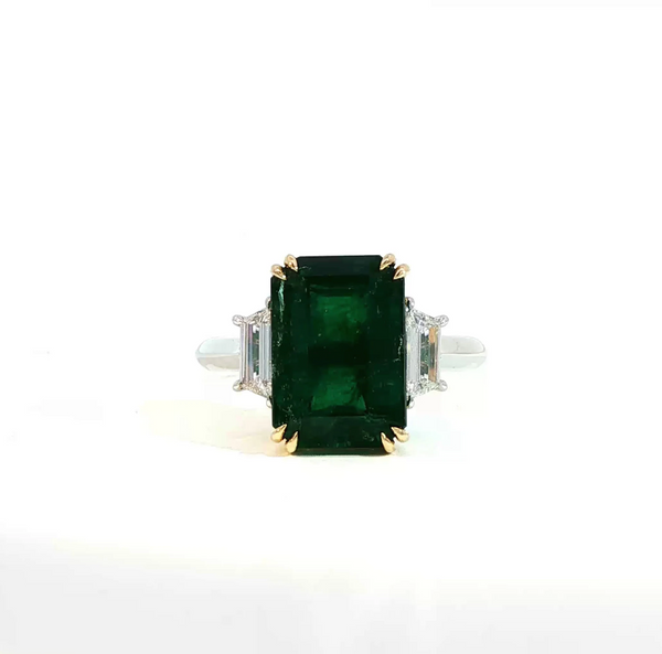Elongated Emerald Cut Emerald and Diamond Bezel Set Trilogy Engagement Ring