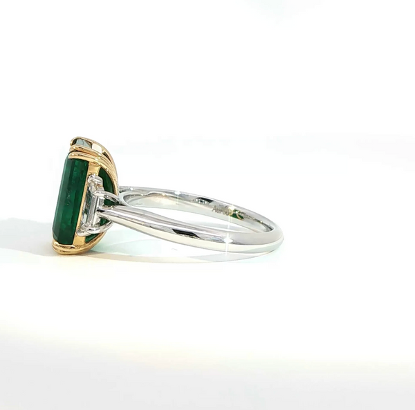Elongated Emerald Cut Emerald and Diamond Bezel Set Trilogy Engagement Ring