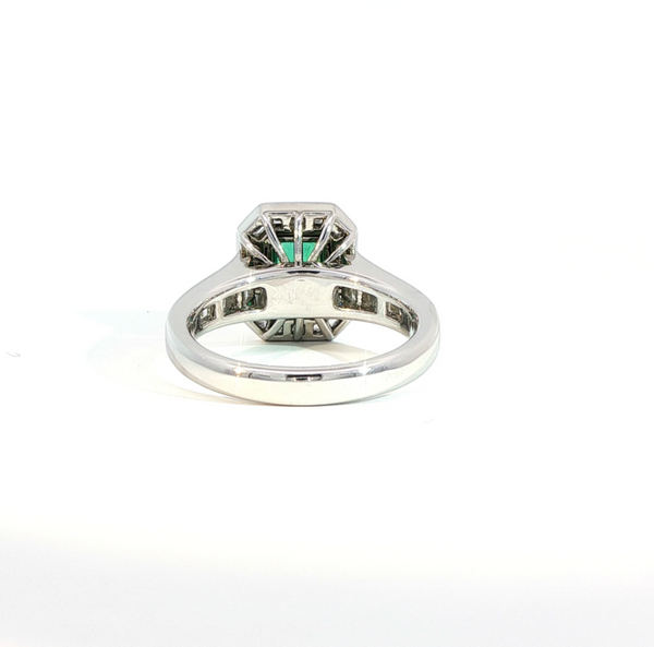 Emerald Cut Emerald and Diamond Bezel Set Art Deco Style Halo Engagement Ring
