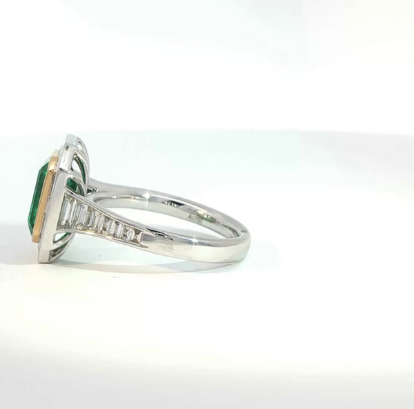 Emerald Cut Emerald and Diamond Bezel Set Art Deco Style Halo Engagement Ring