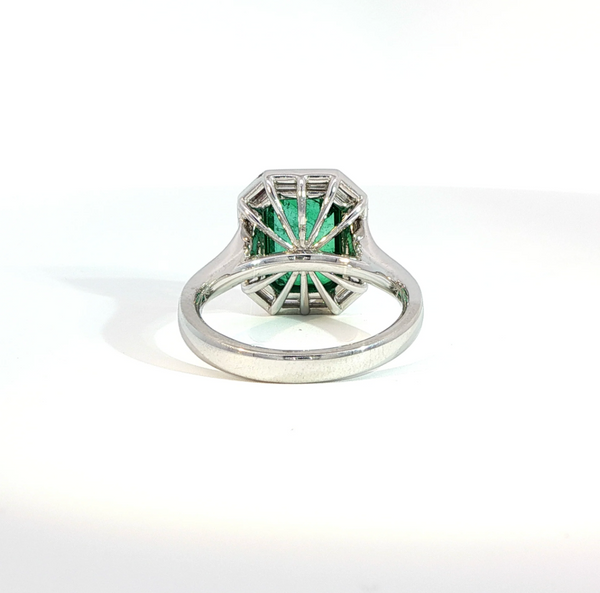 Emerald Cut Emerald and Diamond Bezel Set Art Deco Style Halo Engagement Ring
