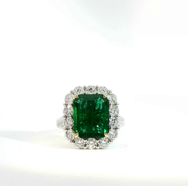 Octagonal Cut Emerald and Diamond Halo Engagement Ring