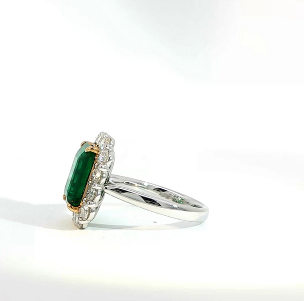 Octagonal Cut Emerald and Diamond Halo Engagement Ring