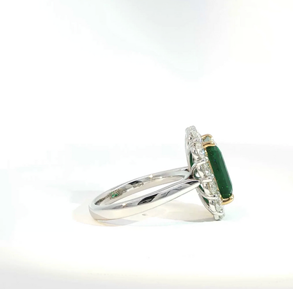 Octagonal Cut Emerald and Diamond Halo Engagement Ring