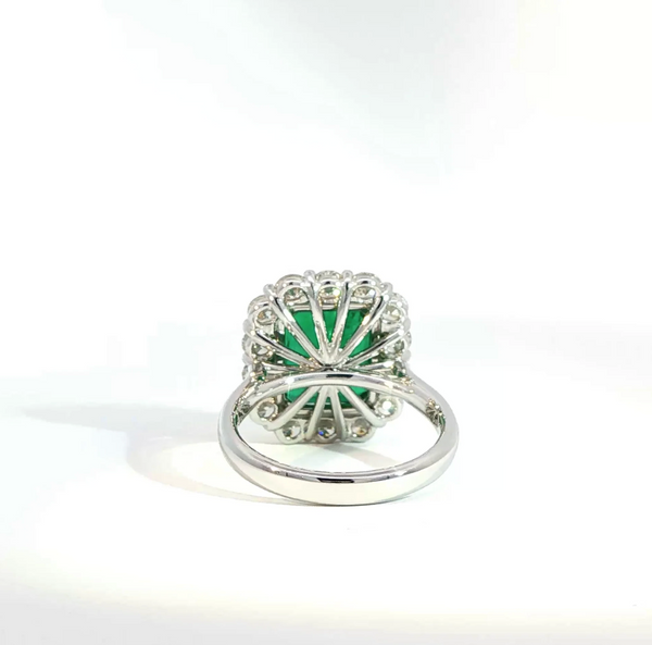 Octagonal Cut Emerald and Diamond Halo Engagement Ring