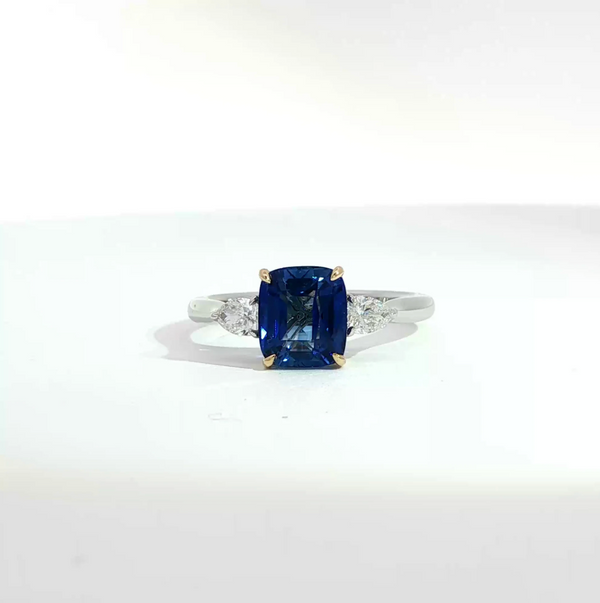 Cushion Cut Sapphire and Diamond Trilogy Engagement Ring