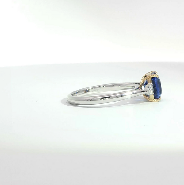 Cushion Cut Sapphire and Diamond Trilogy Engagement Ring