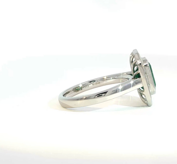 Emerald Cut Emerald and Diamond Bezel Halo Engagement Ring