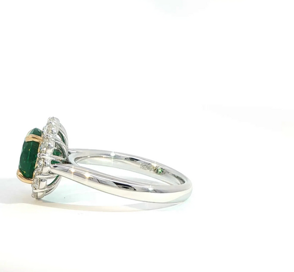 Round Cut Emerald and Diamond Halo Engagement Ring
