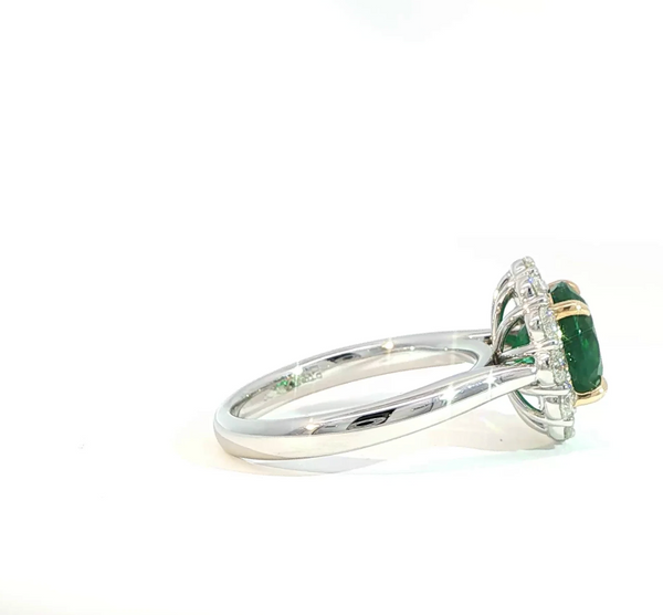 Round Cut Emerald and Diamond Halo Engagement Ring