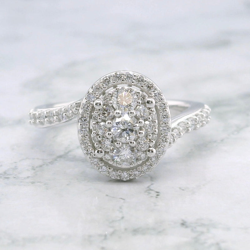 Oval Shape Single Halo Diamond Ring