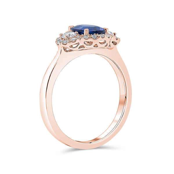 Trilogy Oval Shape Solitaire Blue Sapphire and Round Brilliant Diamond Ring