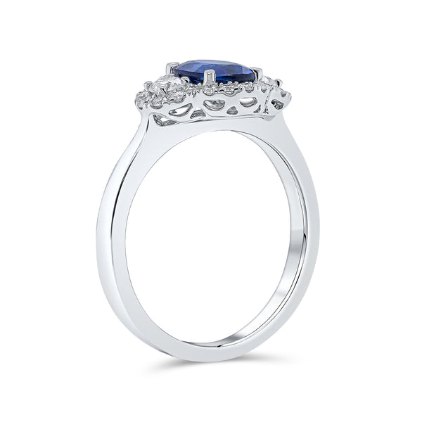Trilogy Oval Shape Solitaire Blue Sapphire and Round Brilliant Diamond Ring