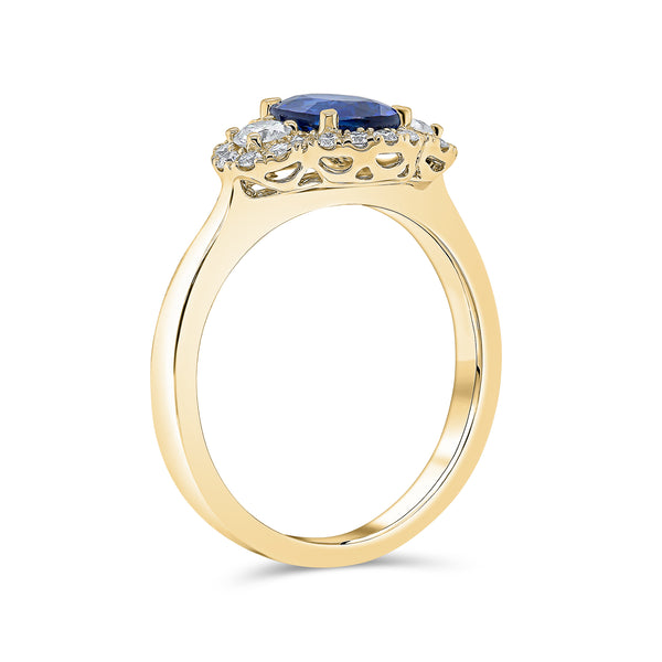 Trilogy Oval Shape Solitaire Blue Sapphire and Round Brilliant Diamond Ring